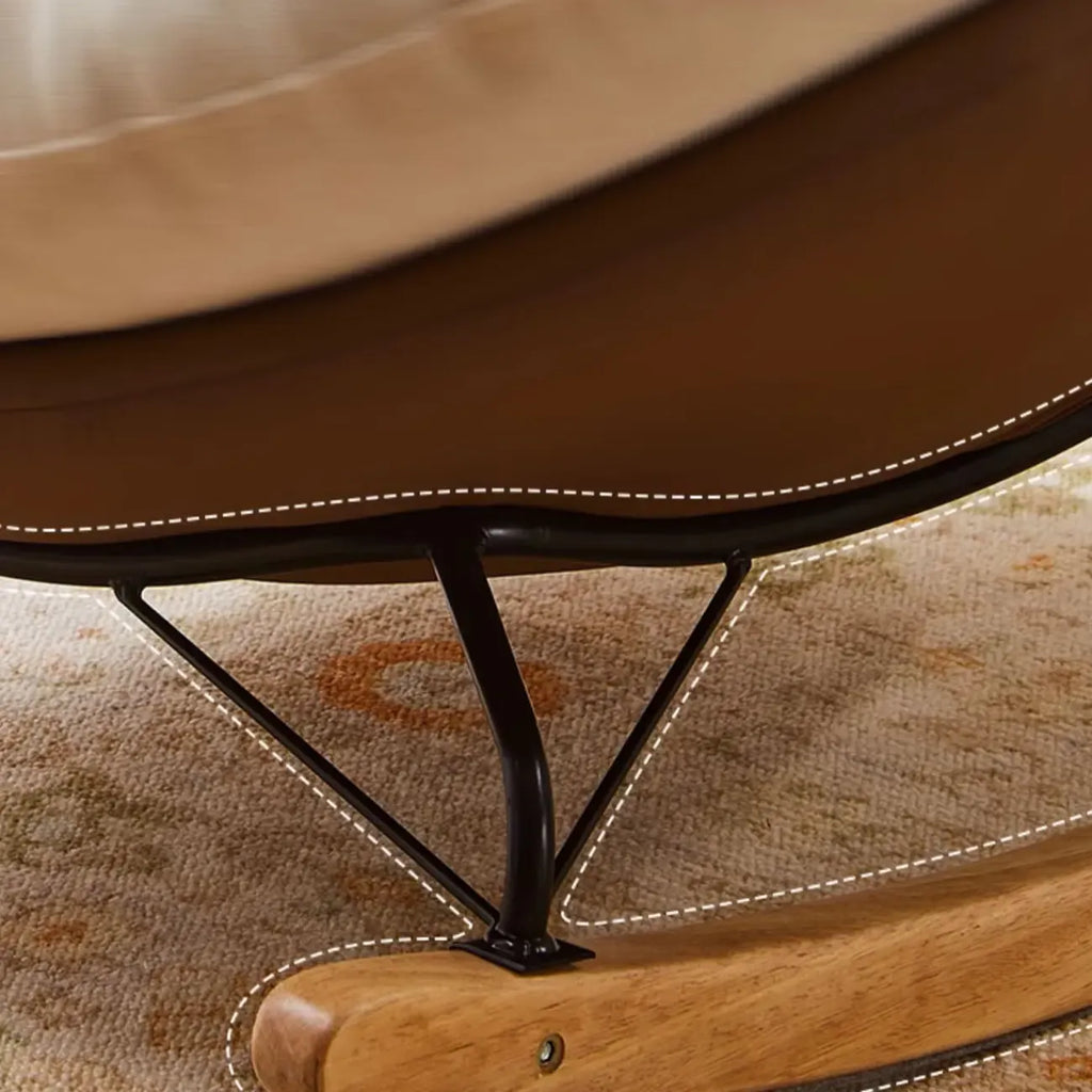 Fauteuil à bascule rembourré beige à assise large avec repose-pieds