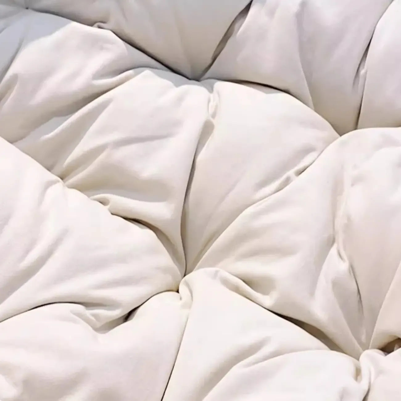 Fauteuil à bascule rembourré sans accoudoirs avec coussin pour salon