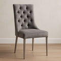 Chaise capitonnée en velours polyester gris structure en métal hauteur 95 cm