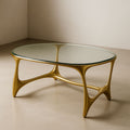Table basse ovale en verre trempé épais avec pieds en métal doré